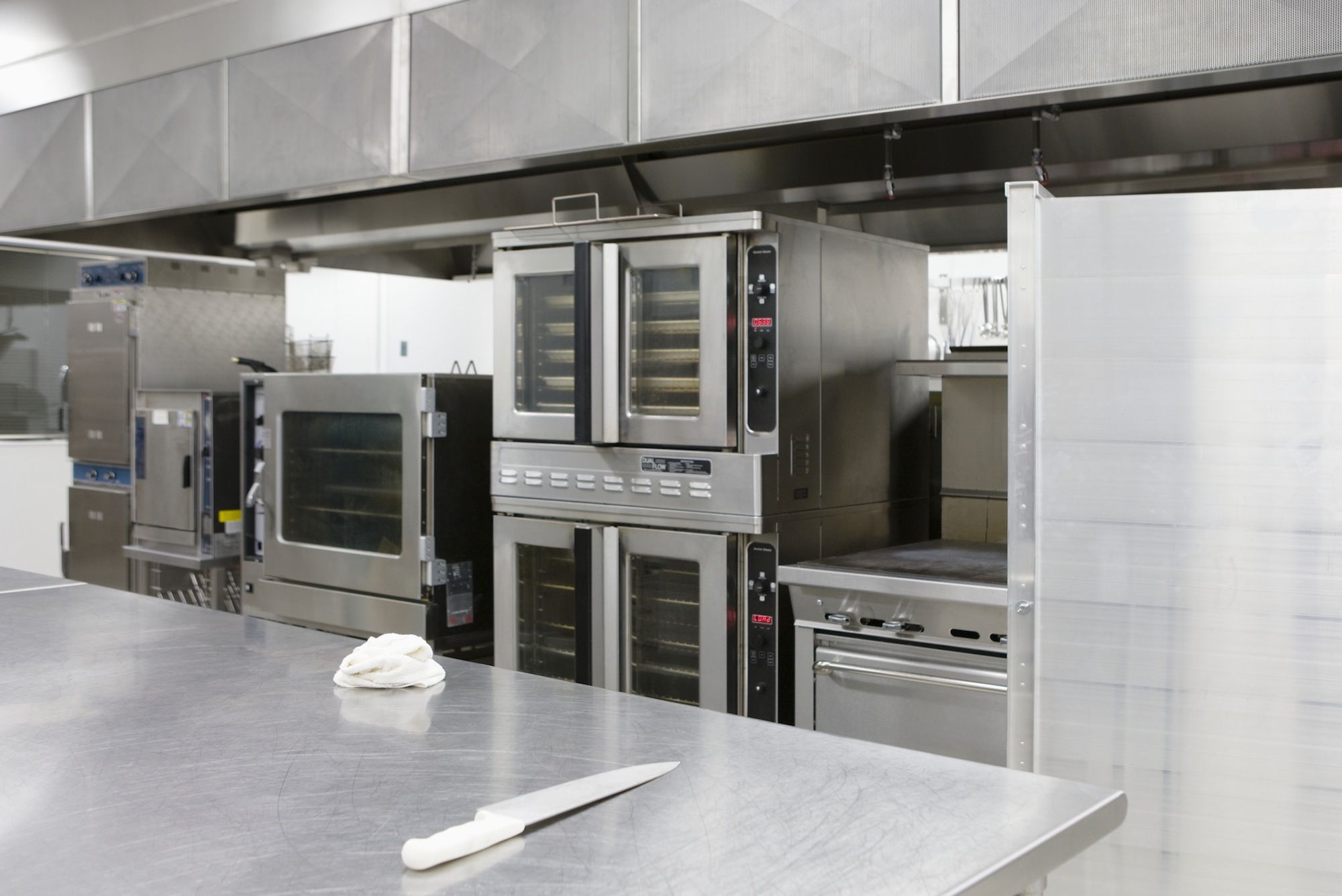 Complete stainless steel kitchen installation including sinks, worktops & units in London